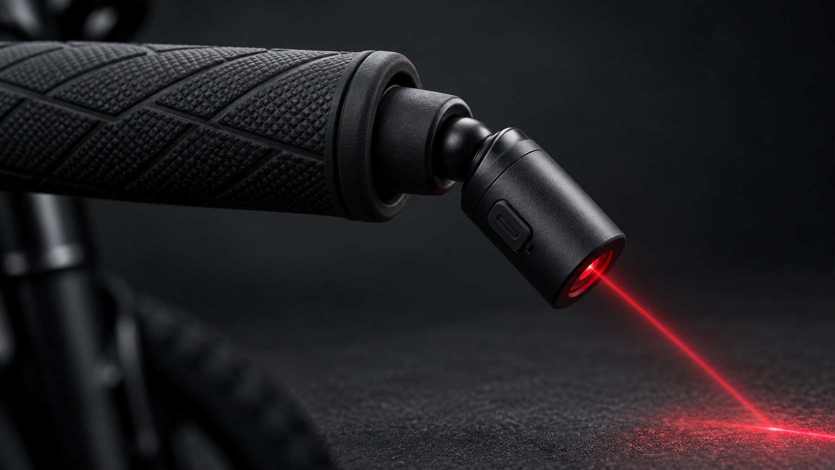 Concept rendering of a rubber handlebar plug connected by a ball joint to a compact cylindrical laser housing